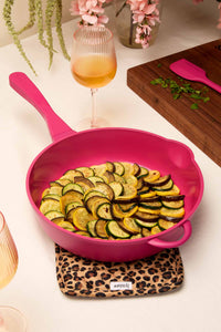 cooking yummy ratatouille food in Lynnee 11" Hot Pink Fry Pan on Leopard Pot Holder